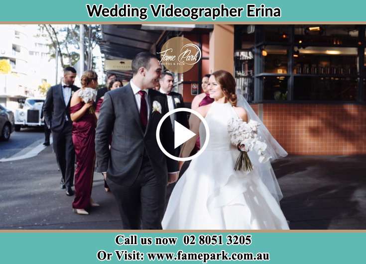 Bride and Groom looking at each other while walking in the street Erina NSW 2250