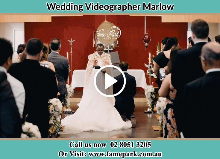 Bride and Groom Kneeling at the altar Marlow NSW 2775