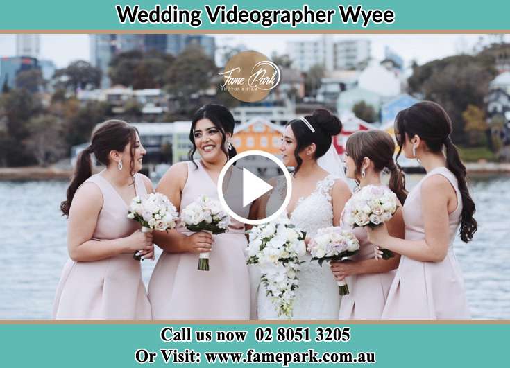 The Bride and her bridesmaids chatting with each other Wyee NSW 2259